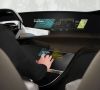 BMW plant, das ‘HoloActive Touch‘ neben dem Lenkrad auf Höhe der Mittelkonsole für den Fahrer sichtbar zu machen.